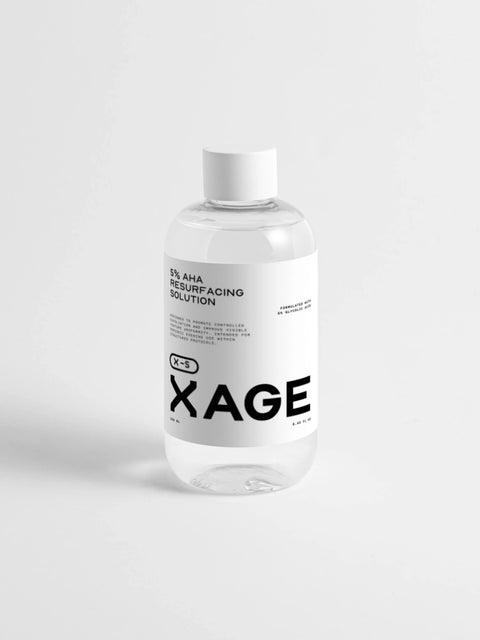 5% AHA resurfacing solution for dull skin, glycolic acid, clear bottle with white label