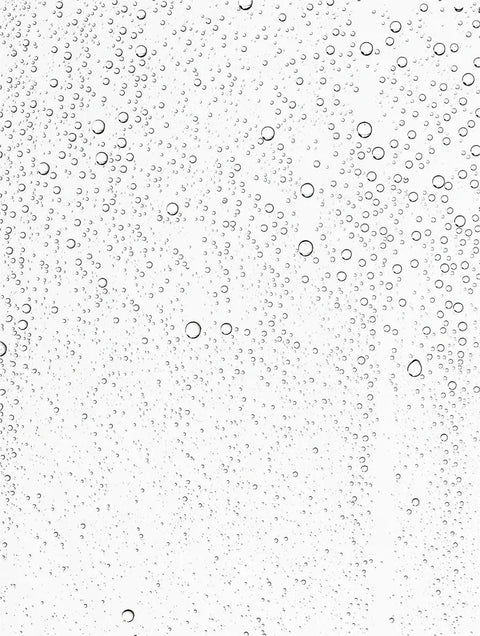 Clear skincare serum texture with hydrating bubbles, close-up, transparent gel formula