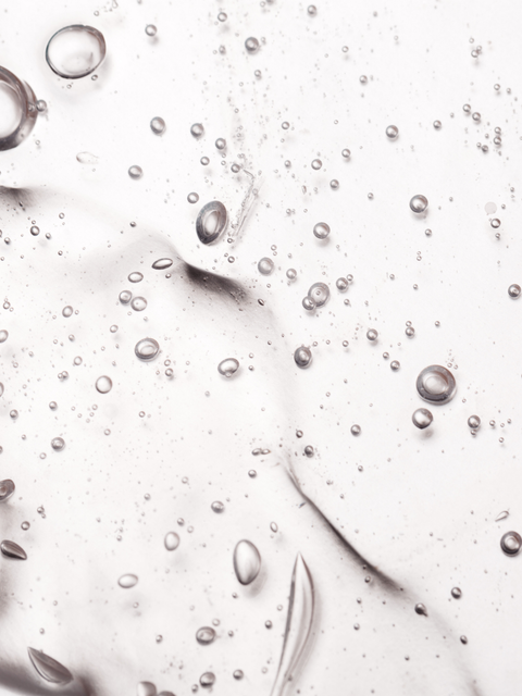 Clear skincare gel texture with air bubbles, suitable for hydration and skin barrier support